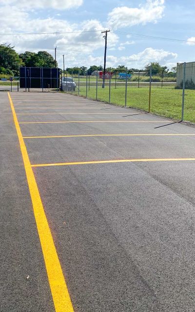 Carpark upgrade with new bright yellow line marking for parking bays