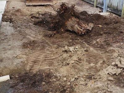 Earthworks and gravel installation project for home property