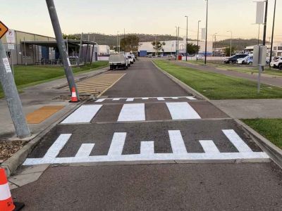 Line marking for pedestrian crossing and EV charging bays at TAFE Townsville